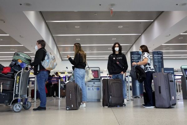 Путешествуйте во время всплеска омикронов: какие авиакомпании должны вам, если они отменят ваш рейс